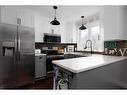 235 Cornwall Drive, Fort Mcmurray, AB  - Indoor Photo Showing Kitchen With Double Sink 