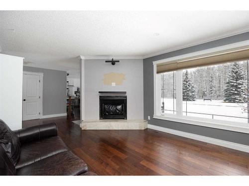 235 Cornwall Drive, Fort Mcmurray, AB - Indoor Photo Showing Living Room With Fireplace