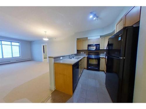 409-108 Denholm Gate, Fort Mcmurray, AB - Indoor Photo Showing Kitchen