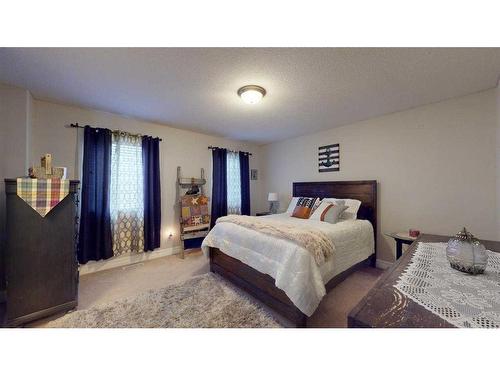 128 Saline Creek Way, Fort Mcmurray, AB - Indoor Photo Showing Bedroom