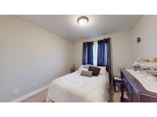 128 Saline Creek Way, Fort Mcmurray, AB - Indoor Photo Showing Bedroom