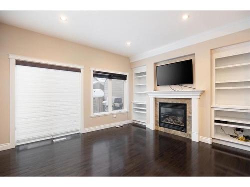 157 Shalestone Way, Fort Mcmurray, AB - Indoor Photo Showing Living Room With Fireplace