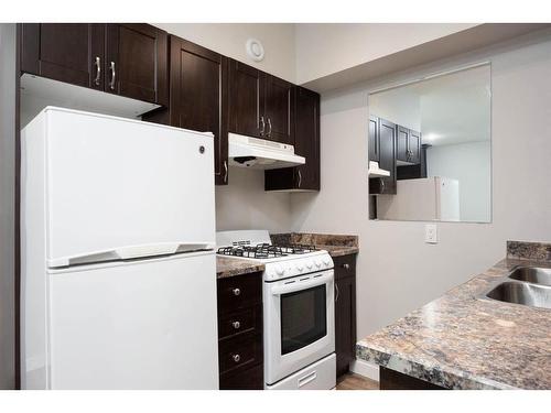 156 Chestnut Way, Fort Mcmurray, AB - Indoor Photo Showing Kitchen With Double Sink