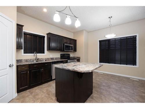 156 Chestnut Way, Fort Mcmurray, AB - Indoor Photo Showing Kitchen With Double Sink