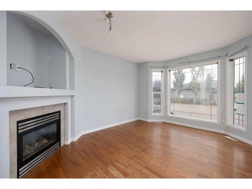 100 Bruin Bay, Fort Mcmurray, AB - Indoor Photo Showing Living Room With Fireplace