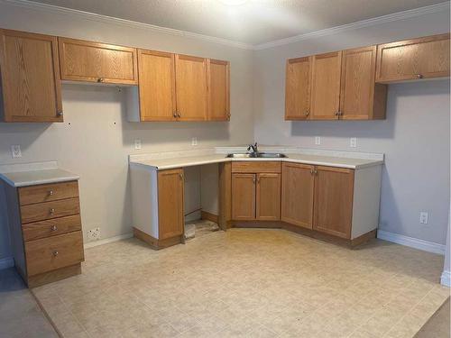 207-253 Gregoire Drive, Fort Mcmurray, AB - Indoor Photo Showing Kitchen With Double Sink