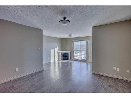 607-8535 Clearwater Drive, Fort Mcmurray, AB - Indoor Photo Showing Living Room With Fireplace