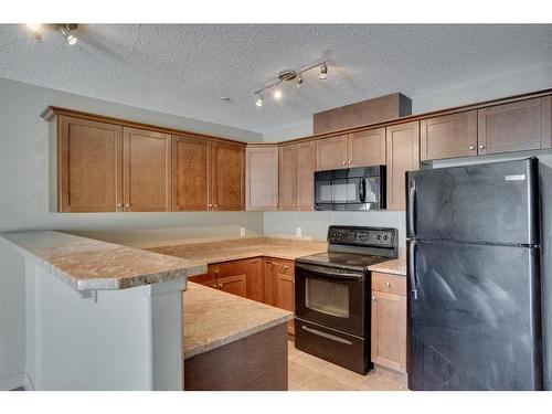 607-8535 Clearwater Drive, Fort Mcmurray, AB - Indoor Photo Showing Kitchen