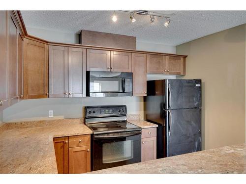 607-8535 Clearwater Drive, Fort Mcmurray, AB - Indoor Photo Showing Kitchen