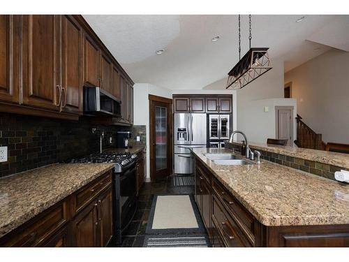 113 Red Lily Gate, Fort Mcmurray, AB - Indoor Photo Showing Kitchen With Double Sink