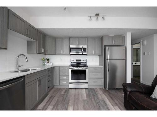 145 Shalestone Place, Fort Mcmurray, AB - Indoor Photo Showing Kitchen With Double Sink