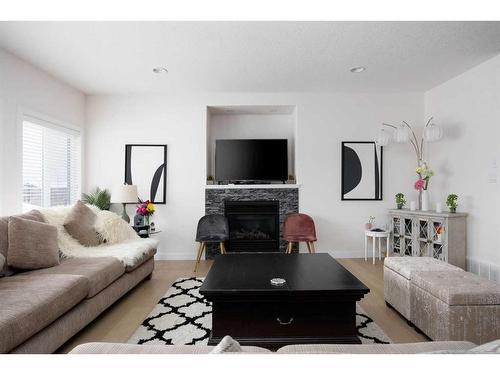 145 Shalestone Place, Fort Mcmurray, AB - Indoor Photo Showing Living Room With Fireplace