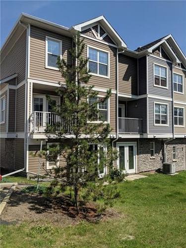 36-180 Riverstone Ridge, Fort Mcmurray, AB - Outdoor With Facade