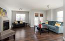 36-180 Riverstone Ridge, Fort Mcmurray, AB  - Indoor Photo Showing Living Room With Fireplace 