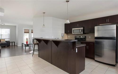 36-180 Riverstone Ridge, Fort Mcmurray, AB - Indoor Photo Showing Kitchen