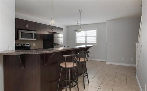 36-180 Riverstone Ridge, Fort Mcmurray, AB - Indoor Photo Showing Kitchen With Upgraded Kitchen