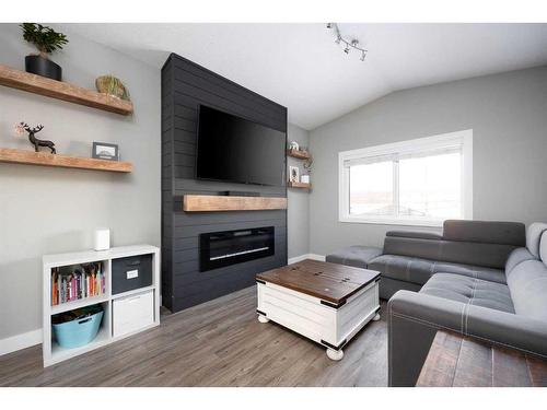 7103 Bulyea Avenue, Fort Mcmurray, AB - Indoor Photo Showing Living Room With Fireplace