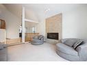 105 Silverdale Garden Sw, Fort Mcmurray, AB  - Indoor Photo Showing Living Room With Fireplace 