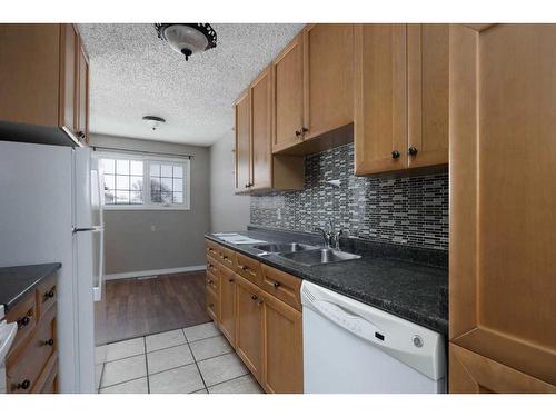 162 Sifton Avenue, Fort Mcmurray, AB - Indoor Photo Showing Kitchen With Double Sink