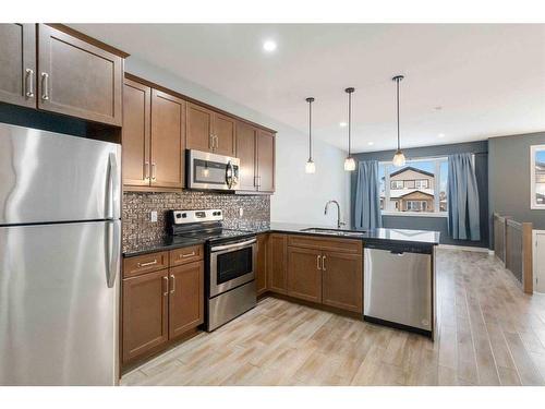 109 Roy Lane, Fort Mcmurray, AB - Indoor Photo Showing Kitchen With Upgraded Kitchen