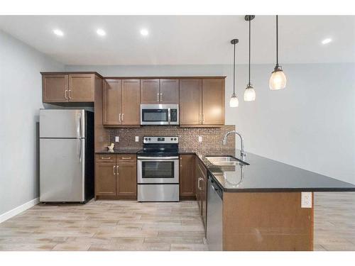 109 Roy Lane, Fort Mcmurray, AB - Indoor Photo Showing Kitchen With Double Sink With Upgraded Kitchen