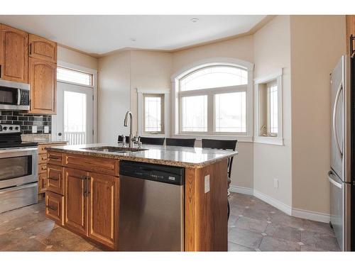 124 Woodpecker Green, Fort Mcmurray, AB - Indoor Photo Showing Kitchen With Stainless Steel Kitchen