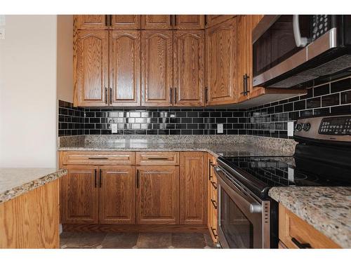 124 Woodpecker Green, Fort Mcmurray, AB - Indoor Photo Showing Kitchen