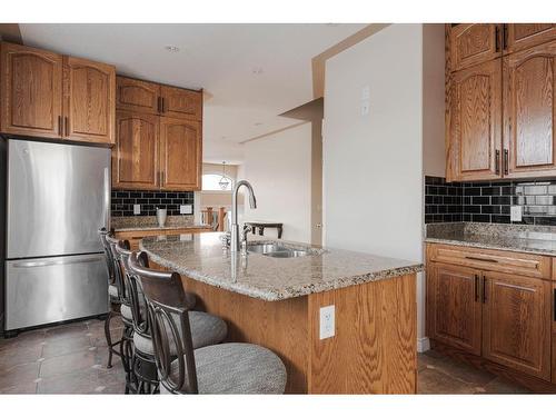 124 Woodpecker Green, Fort Mcmurray, AB - Indoor Photo Showing Kitchen With Double Sink