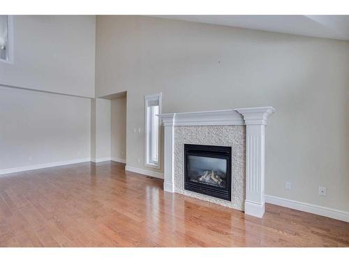 255 Wild Rose Street, Fort Mcmurray, AB - Indoor Photo Showing Living Room With Fireplace