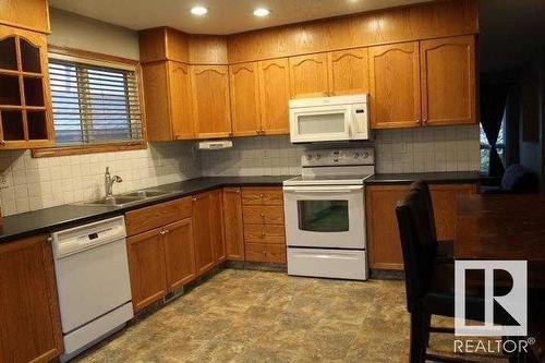 146 Erindale Road, Fort Mcmurray, AB - Indoor Photo Showing Kitchen With Double Sink