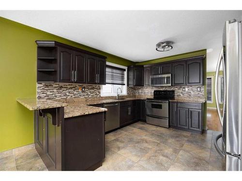 221 Crown Creek Lane, Fort Mcmurray, AB - Indoor Photo Showing Kitchen With Upgraded Kitchen