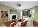 221 Crown Creek Lane, Fort Mcmurray, AB  - Indoor Photo Showing Living Room With Fireplace 