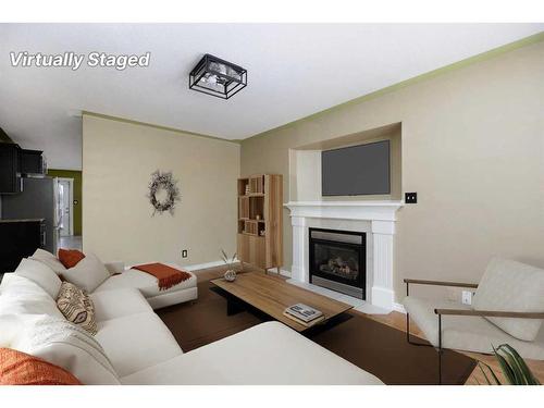 221 Crown Creek Lane, Fort Mcmurray, AB - Indoor Photo Showing Living Room With Fireplace