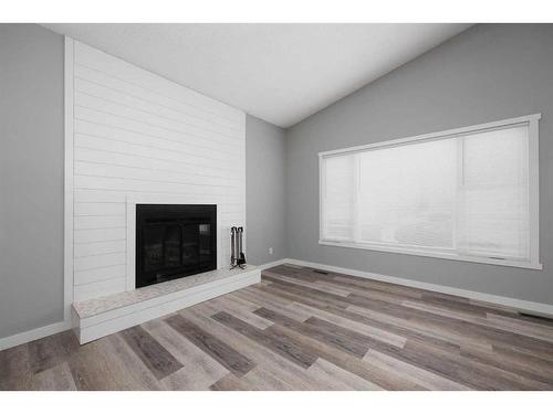 218 Kennedy Crescent, Fort Mcmurray, AB - Indoor Photo Showing Living Room With Fireplace