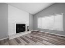 218 Kennedy Crescent, Fort Mcmurray, AB  - Indoor Photo Showing Living Room With Fireplace 