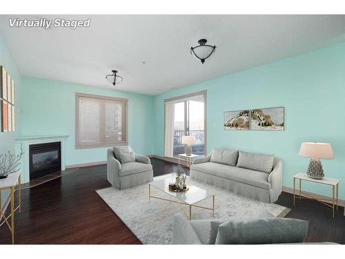 204-8535 Clearwater Drive, Fort Mcmurray, AB - Indoor Photo Showing Living Room With Fireplace