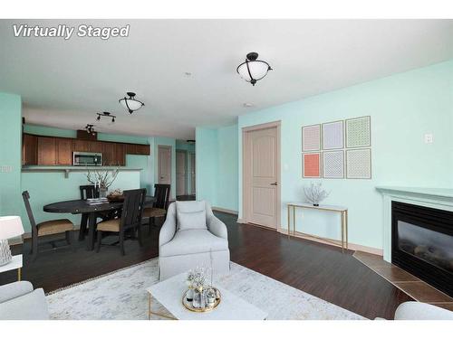 204-8535 Clearwater Drive, Fort Mcmurray, AB - Indoor Photo Showing Living Room With Fireplace