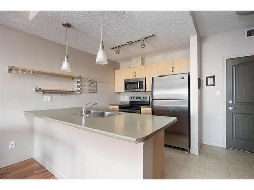 510-136D Sandpiper Road, Fort Mcmurray, AB - Indoor Photo Showing Kitchen With Double Sink