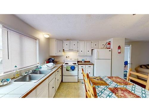 301 Grenfell Crescent, Fort Mcmurray, AB - Indoor Photo Showing Kitchen With Double Sink