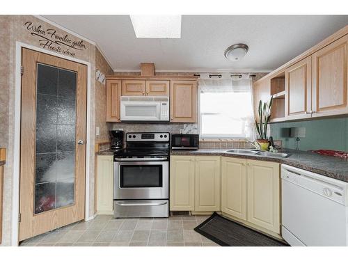 181 Clausen Crescent, Fort Mcmurray, AB - Indoor Photo Showing Kitchen With Double Sink