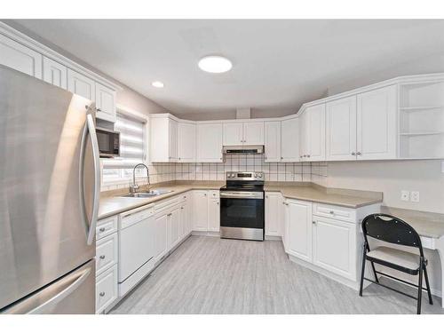 707-105 Loutit Road, Fort Mcmurray, AB - Indoor Photo Showing Kitchen With Double Sink