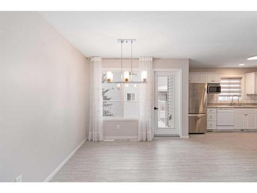 707-105 Loutit Road, Fort Mcmurray, AB - Indoor Photo Showing Kitchen With Double Sink