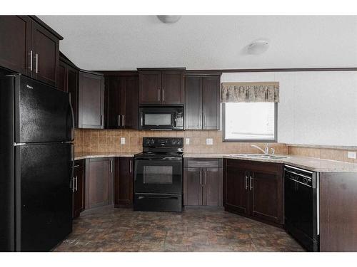 305 Gregoire Crescent, Fort Mcmurray, AB - Indoor Photo Showing Kitchen