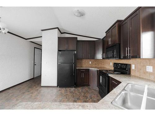 305 Gregoire Crescent, Fort Mcmurray, AB - Indoor Photo Showing Kitchen With Double Sink