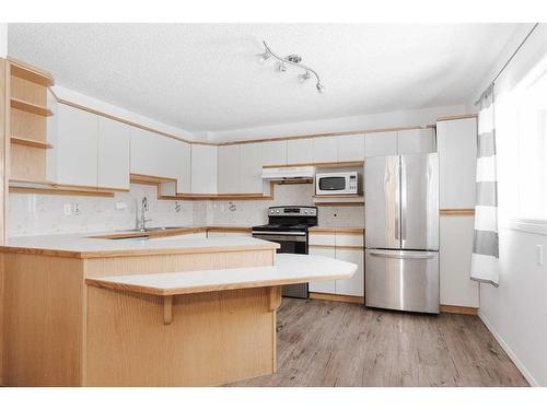 141-400 Silin Forest Road, Fort Mcmurray, AB - Indoor Photo Showing Kitchen With Double Sink