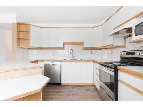 141-400 Silin Forest Road, Fort Mcmurray, AB - Indoor Photo Showing Kitchen With Double Sink