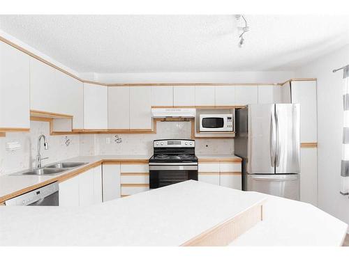 141-400 Silin Forest Road, Fort Mcmurray, AB - Indoor Photo Showing Kitchen With Double Sink