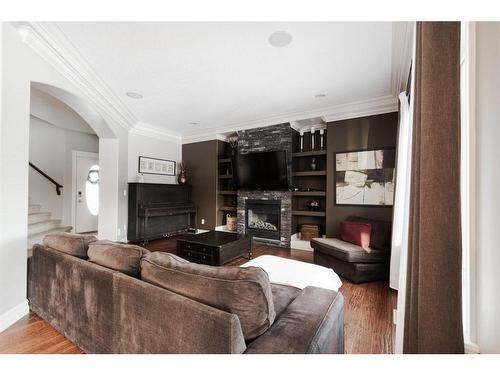 788 Heritage Drive, Fort Mcmurray, AB - Indoor Photo Showing Living Room With Fireplace