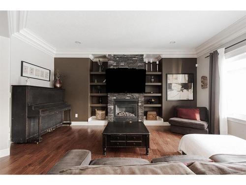 788 Heritage Drive, Fort Mcmurray, AB - Indoor Photo Showing Living Room With Fireplace