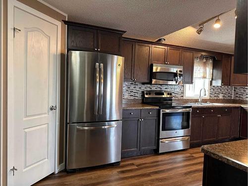 132 Morgan Avenue, Fort Mcmurray, AB - Indoor Photo Showing Kitchen With Double Sink